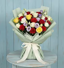 Букет цветов из:  Розы в Комгарон